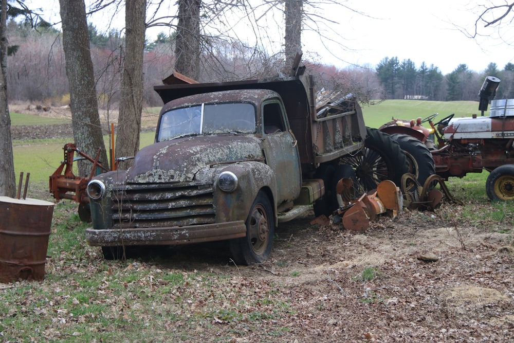 old trucks in a forest