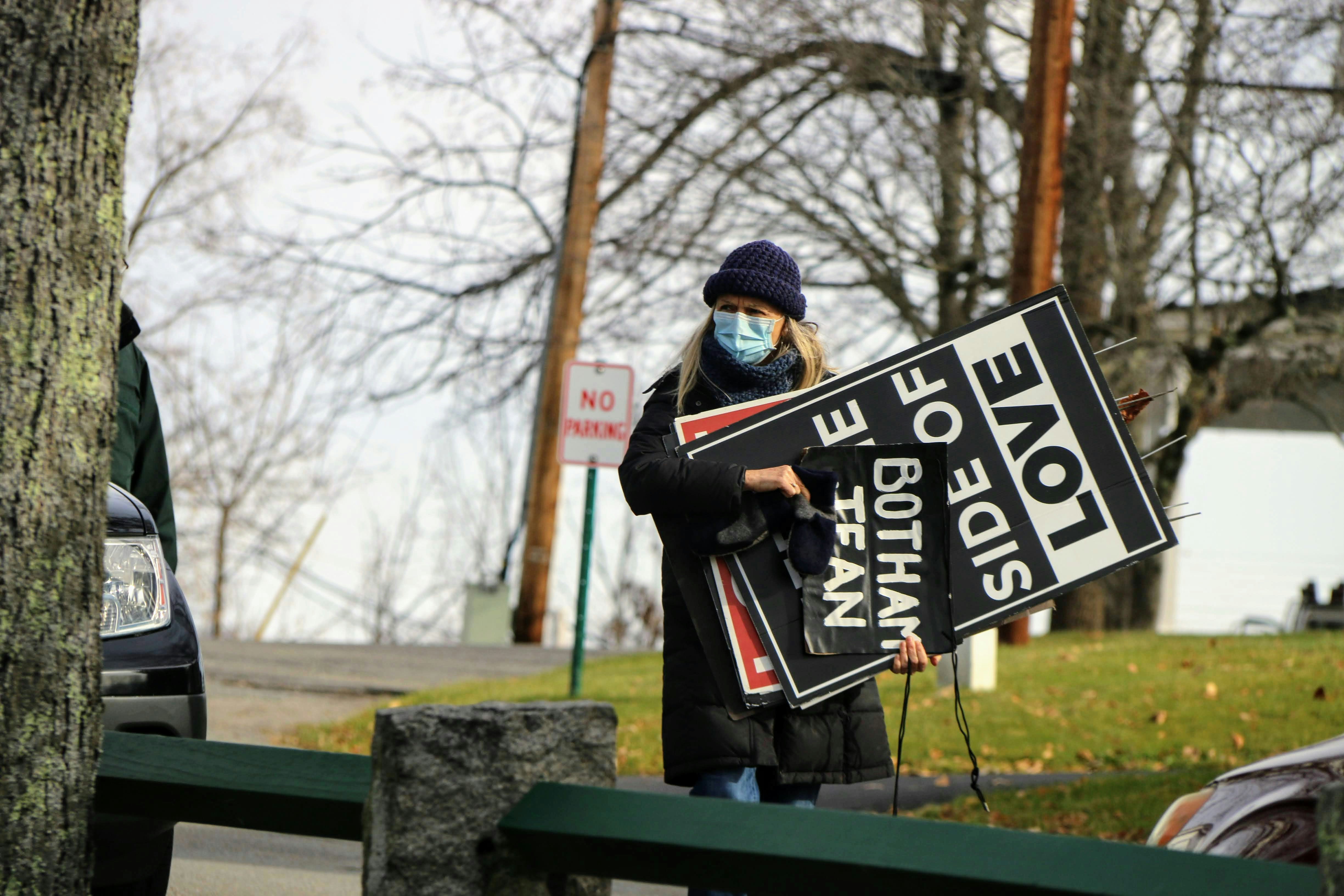 a person holding a sign