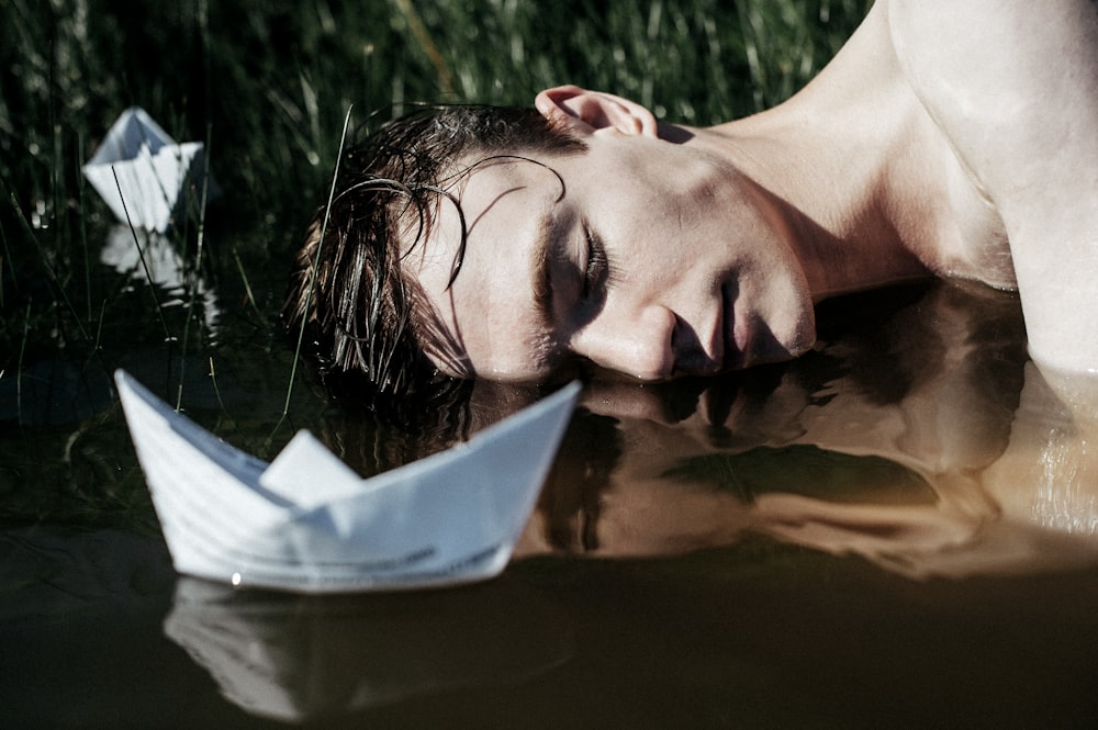a person lying in water