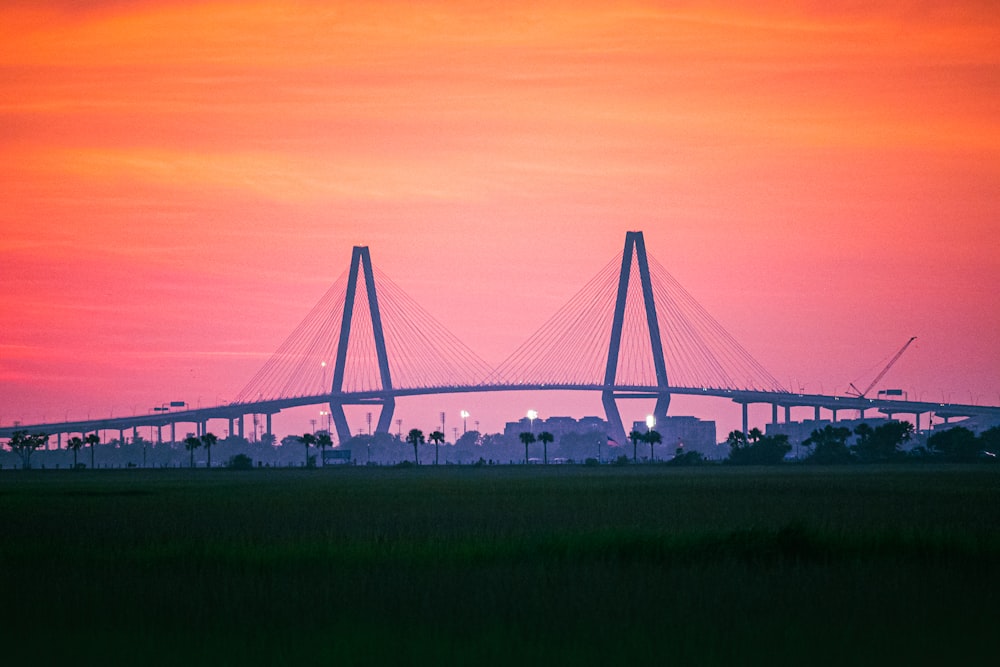 Arthur Ravenel Jr. Bridge with a sunset in the background