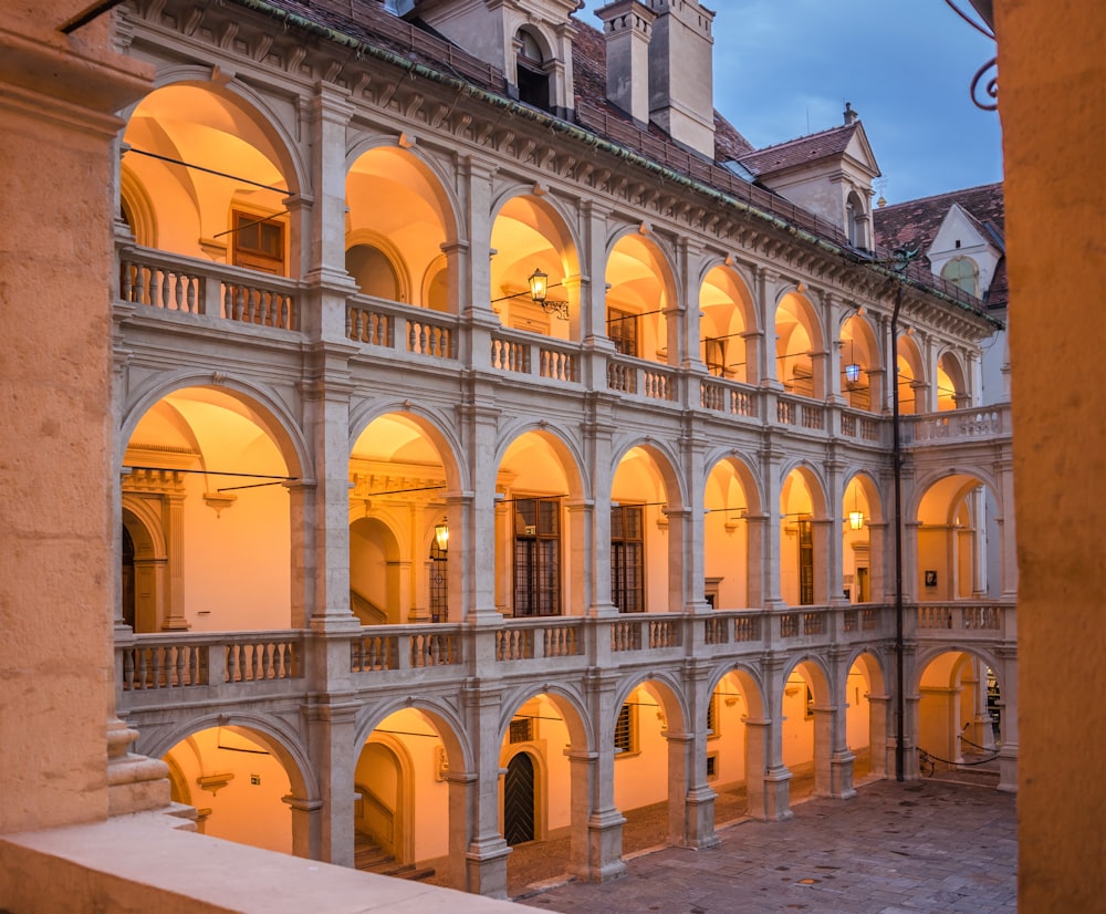 a building with arches and windows