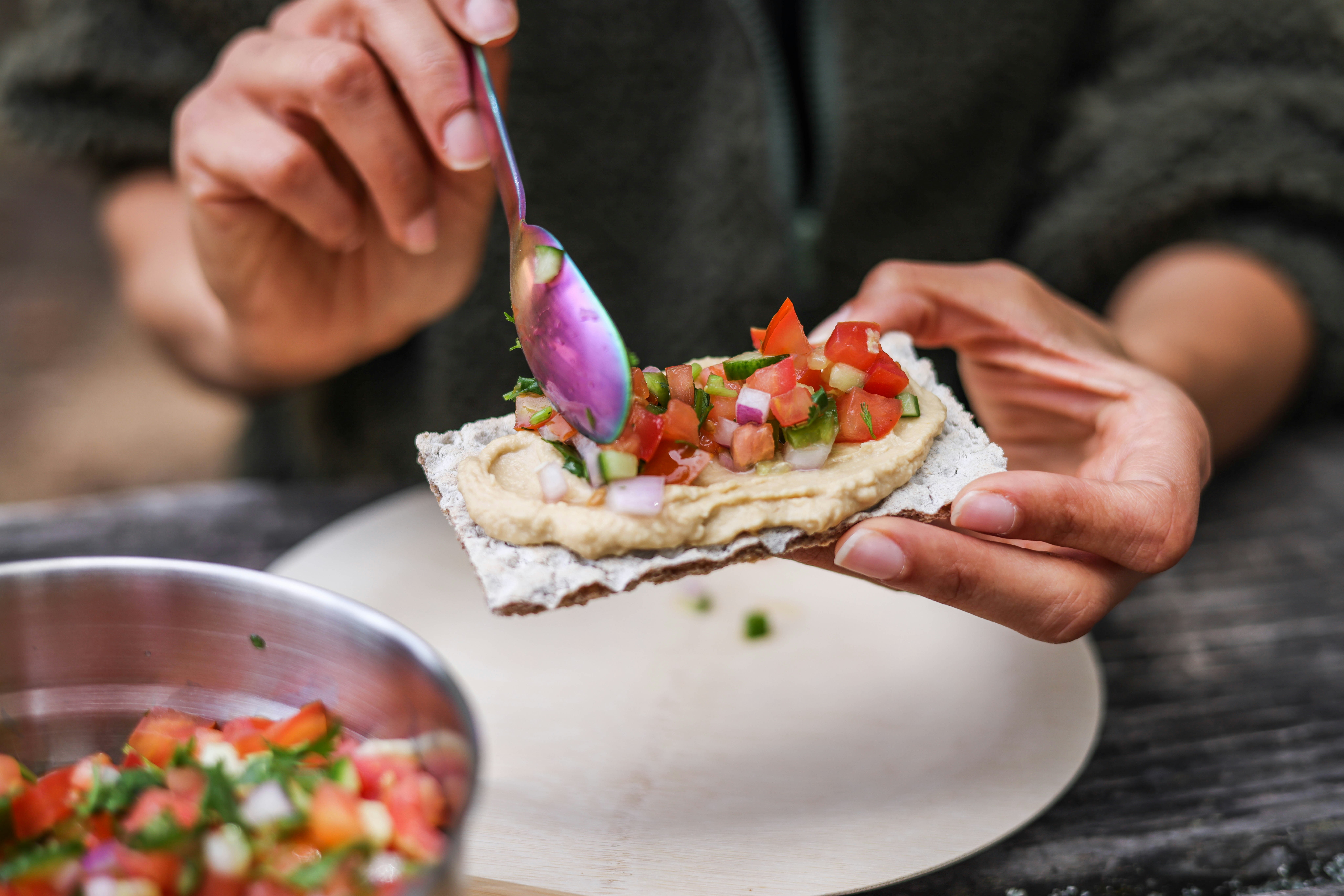 a person eating a sandwich