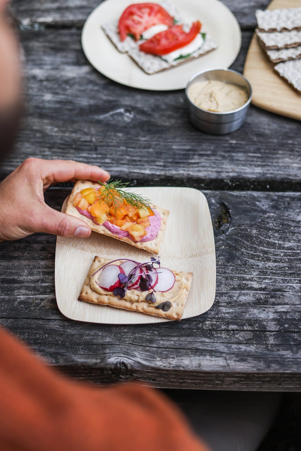 a slice of pizza sitting on top of a wooden cutting board