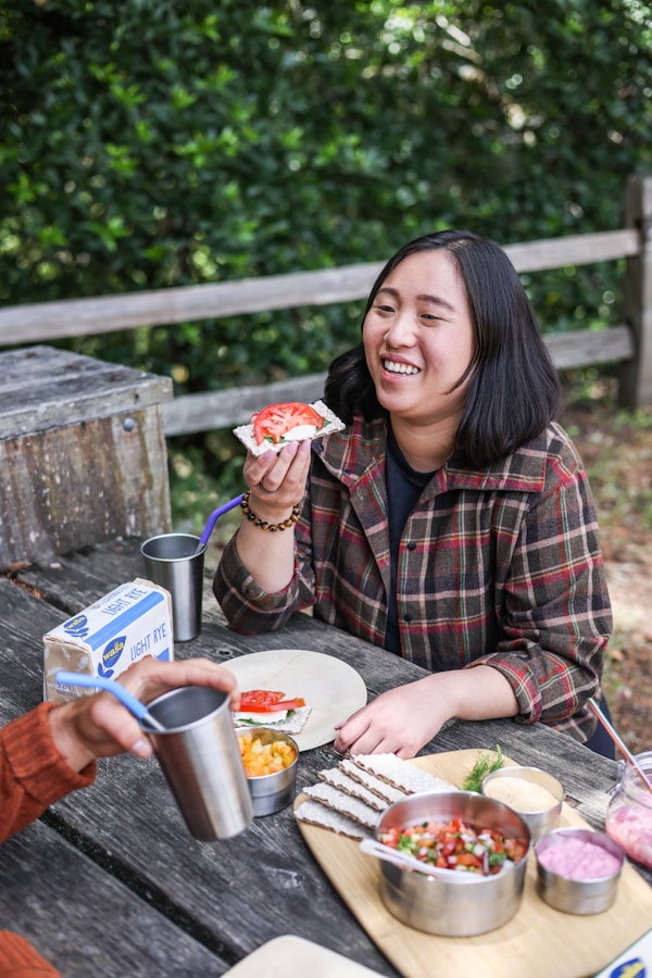 A person eating food outside