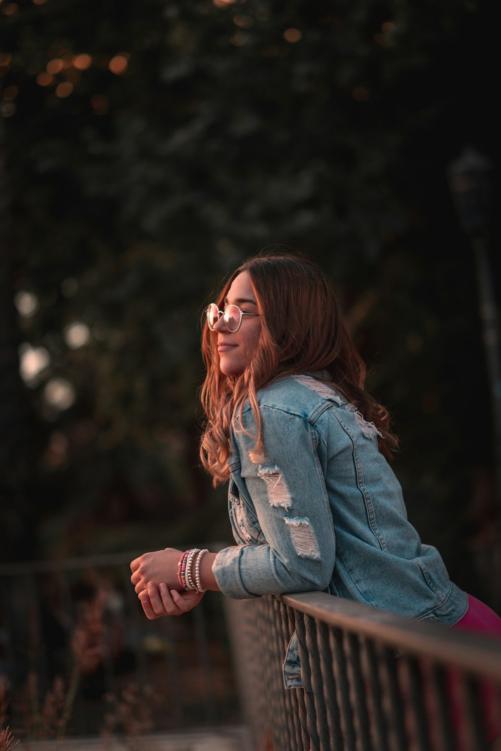 a woman sitting on a bench