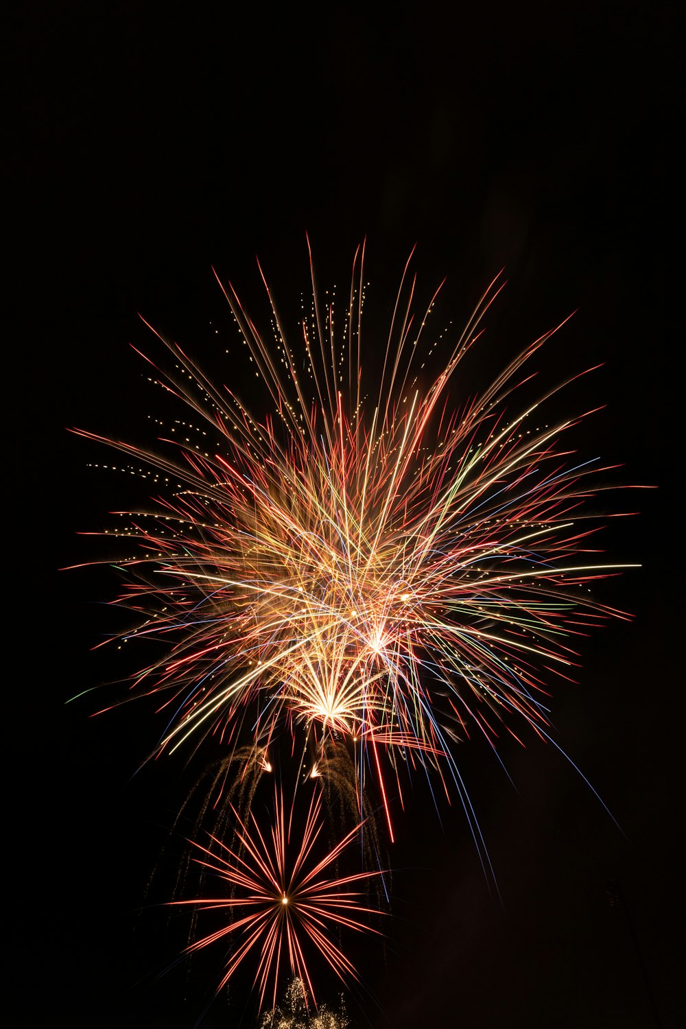 a firework exploding in the sky