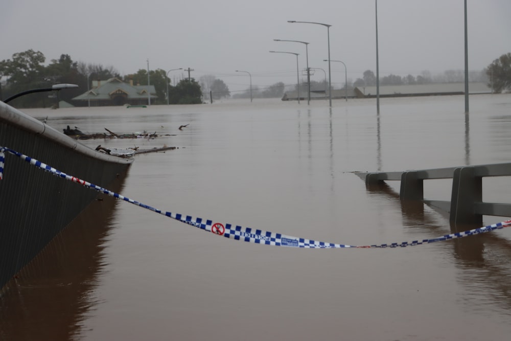 a flooded area with a bridge