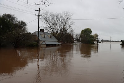 a flooded area with a house