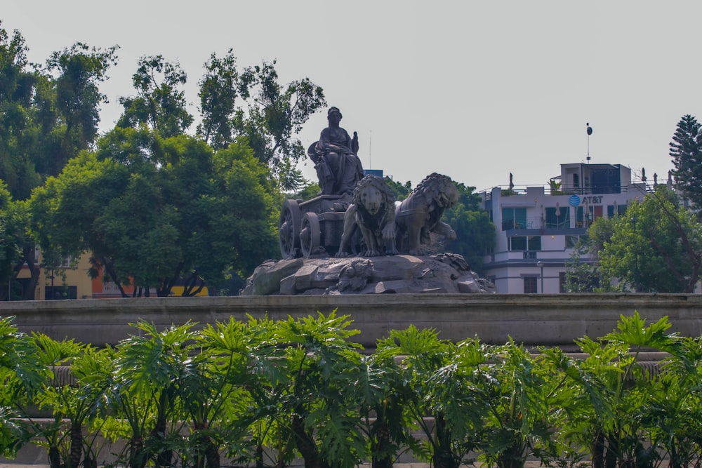 a statue of a person riding a horse