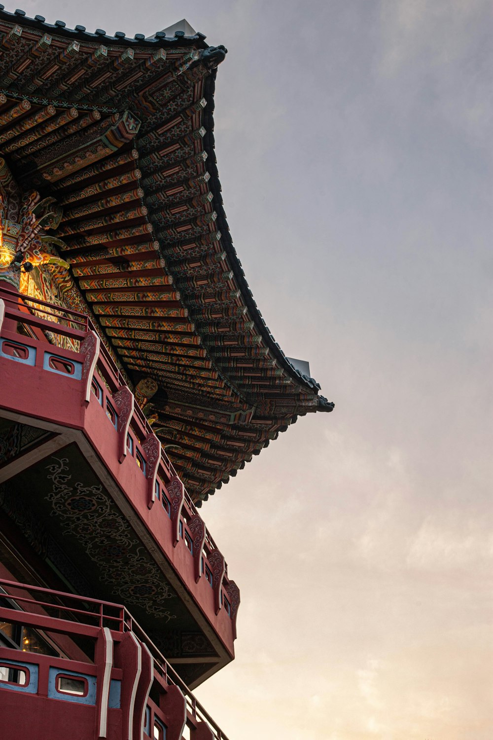 a tall building with a gold roof