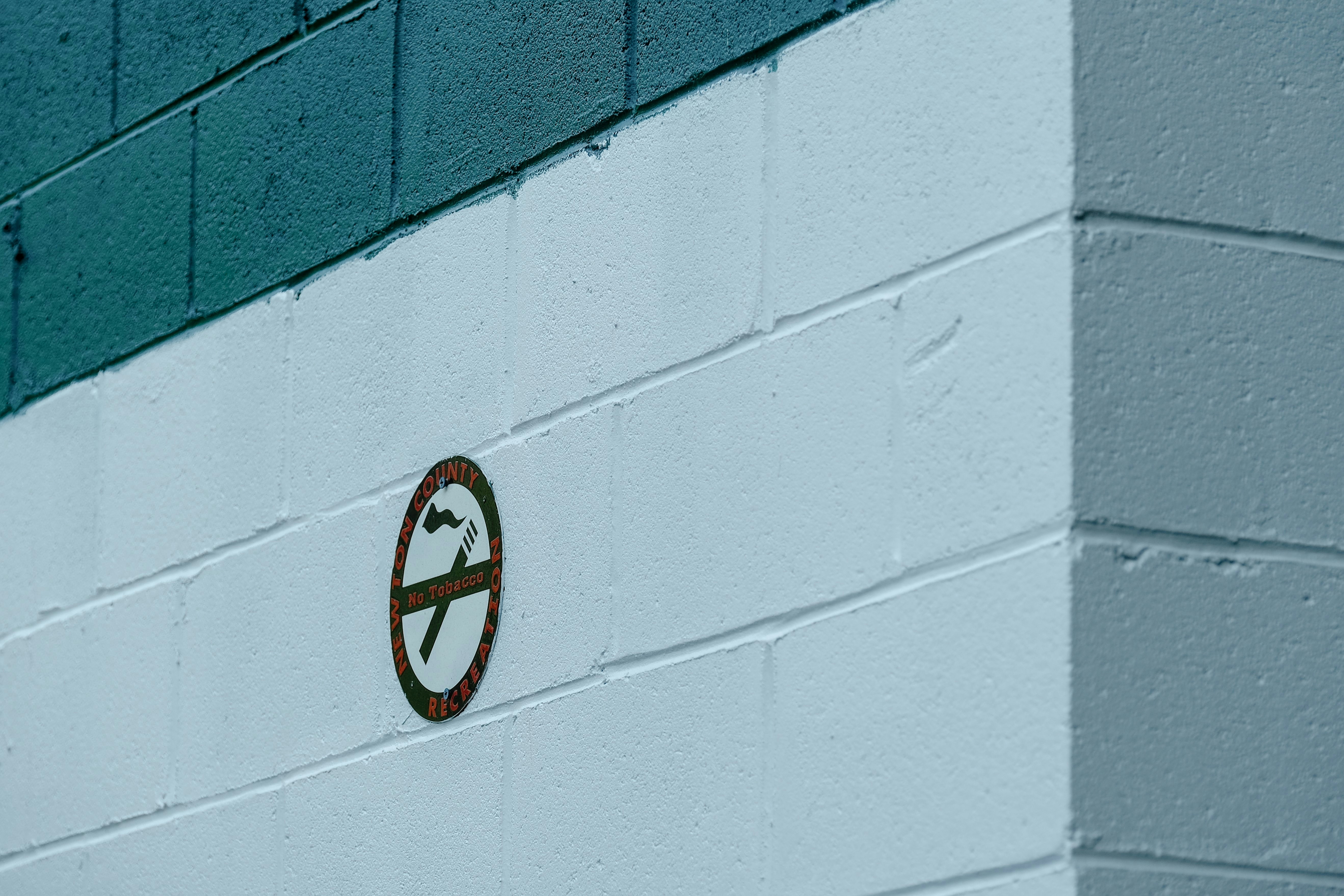 a white wall with a logo