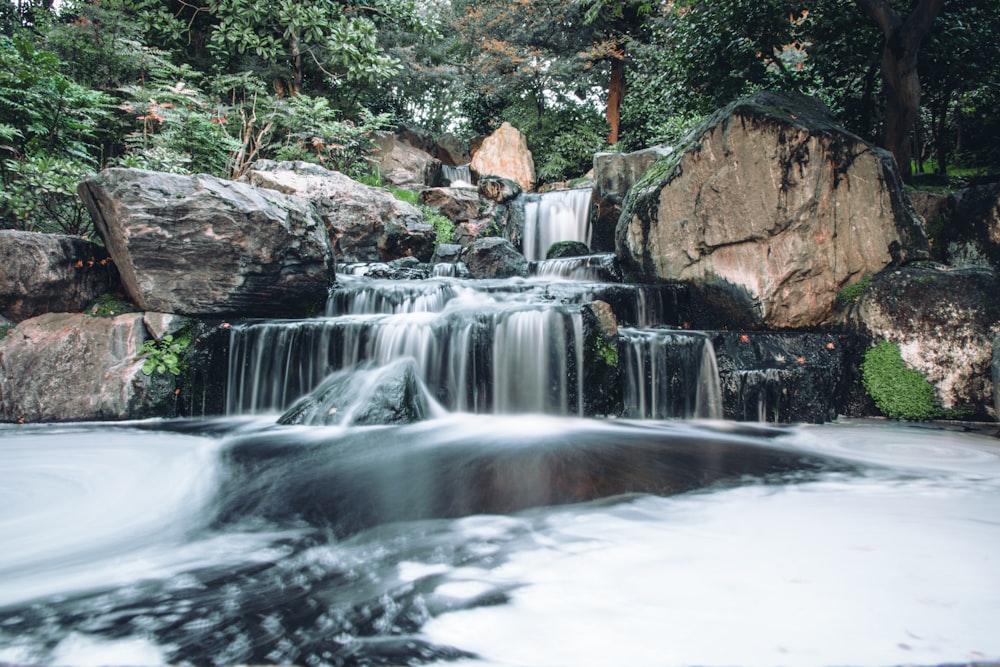 a waterfall in a forest