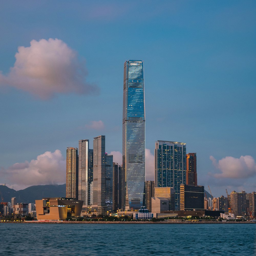 International Commerce Centre skyline with a body of water in the foreground
