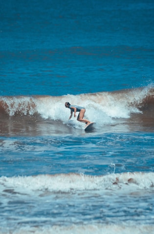 a surfer riding a wave