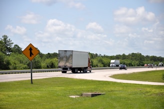 a truck driving down the road
