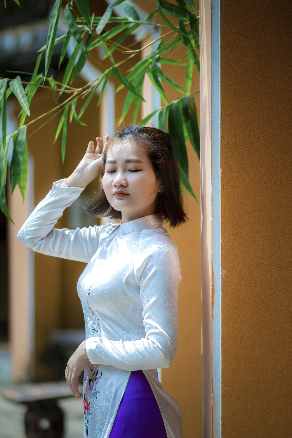 a girl holding a plant