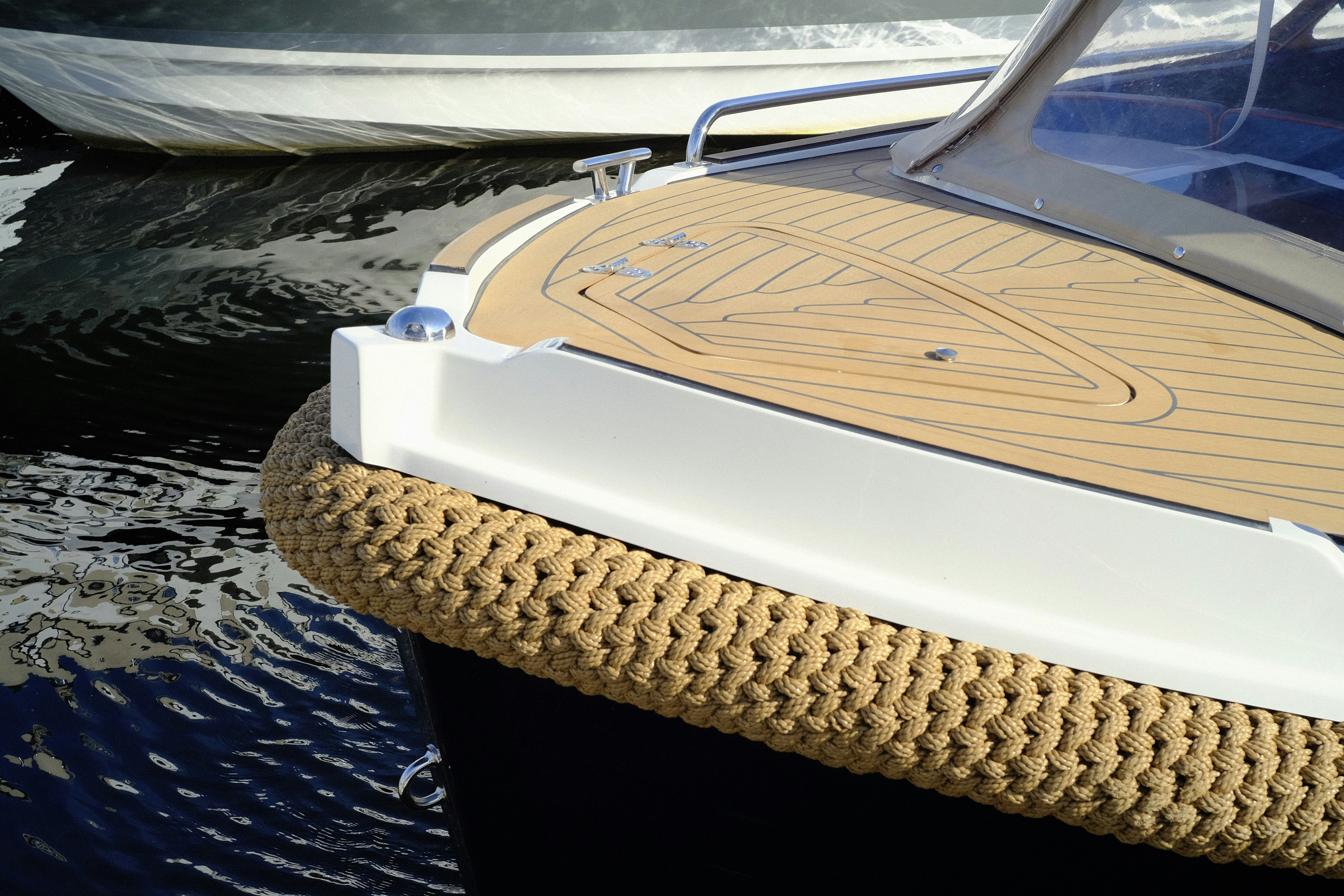 a white boat on water