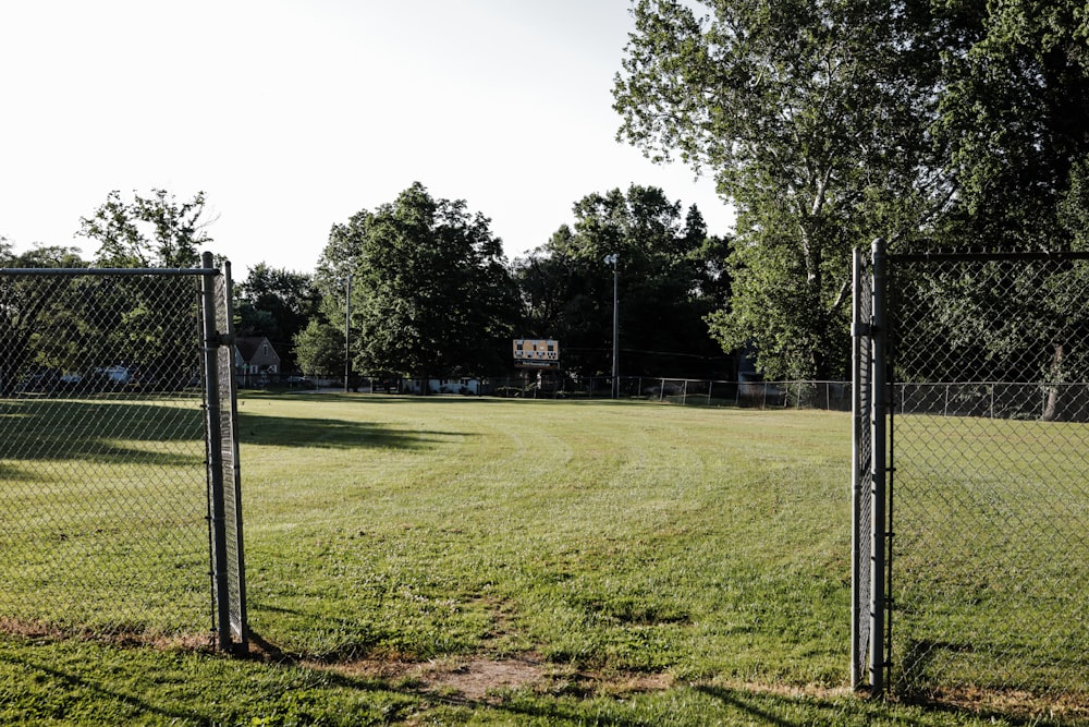 a football field with a fence
