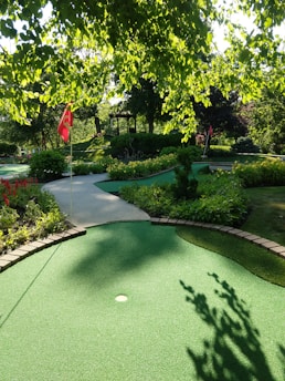 a golf course with a flag