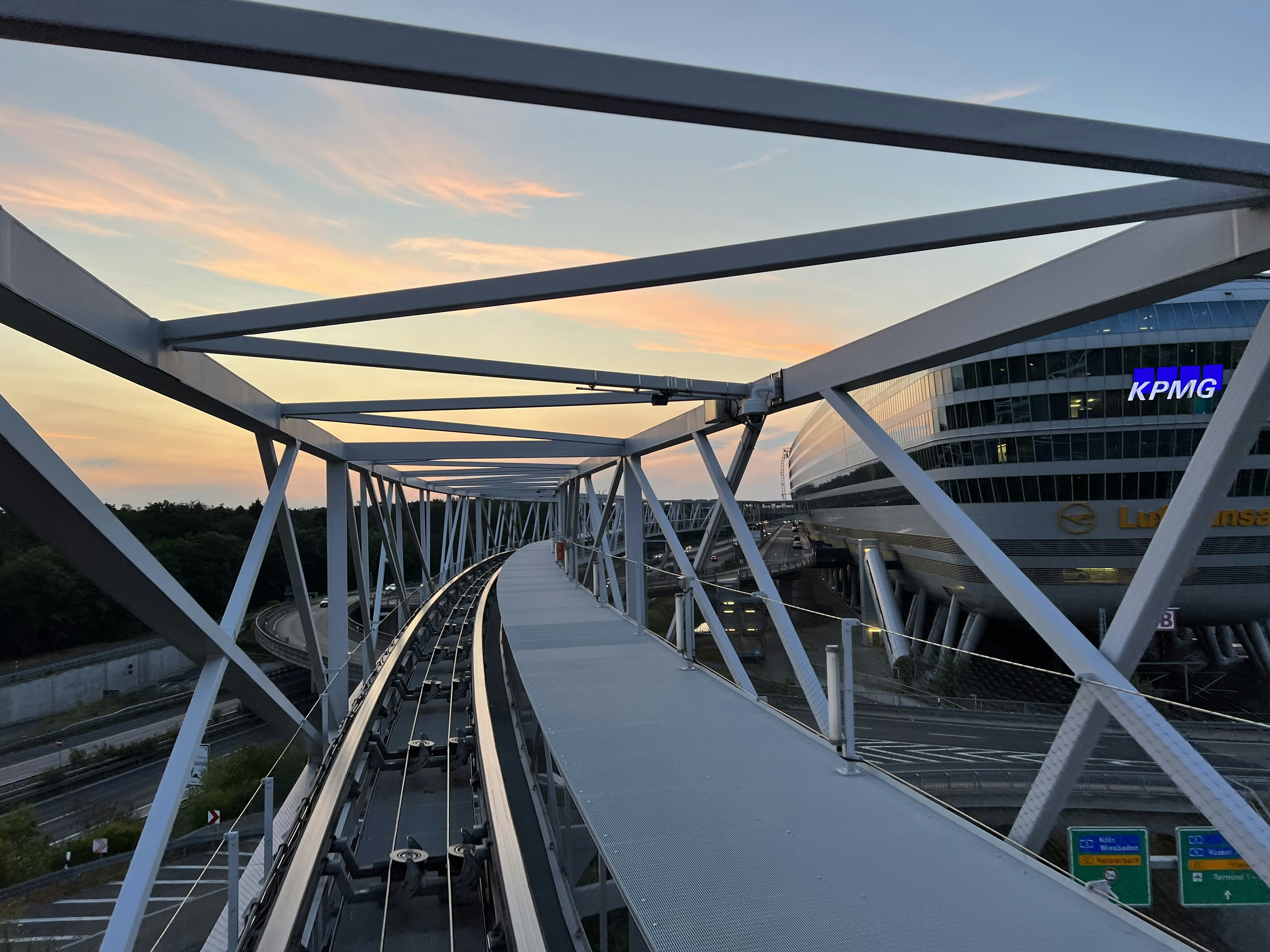 a bridge with a building in the background