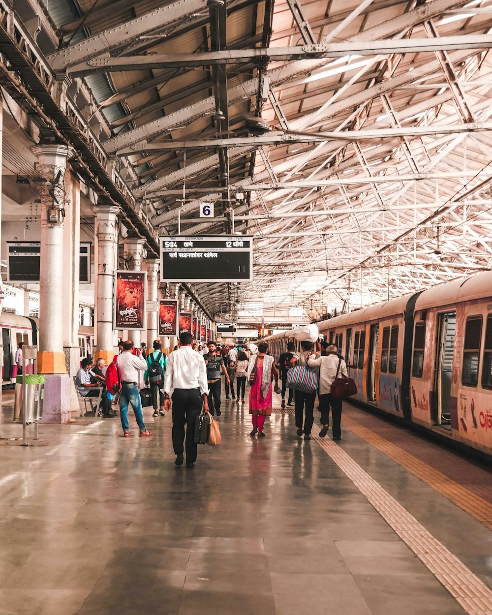 people walking in a train station