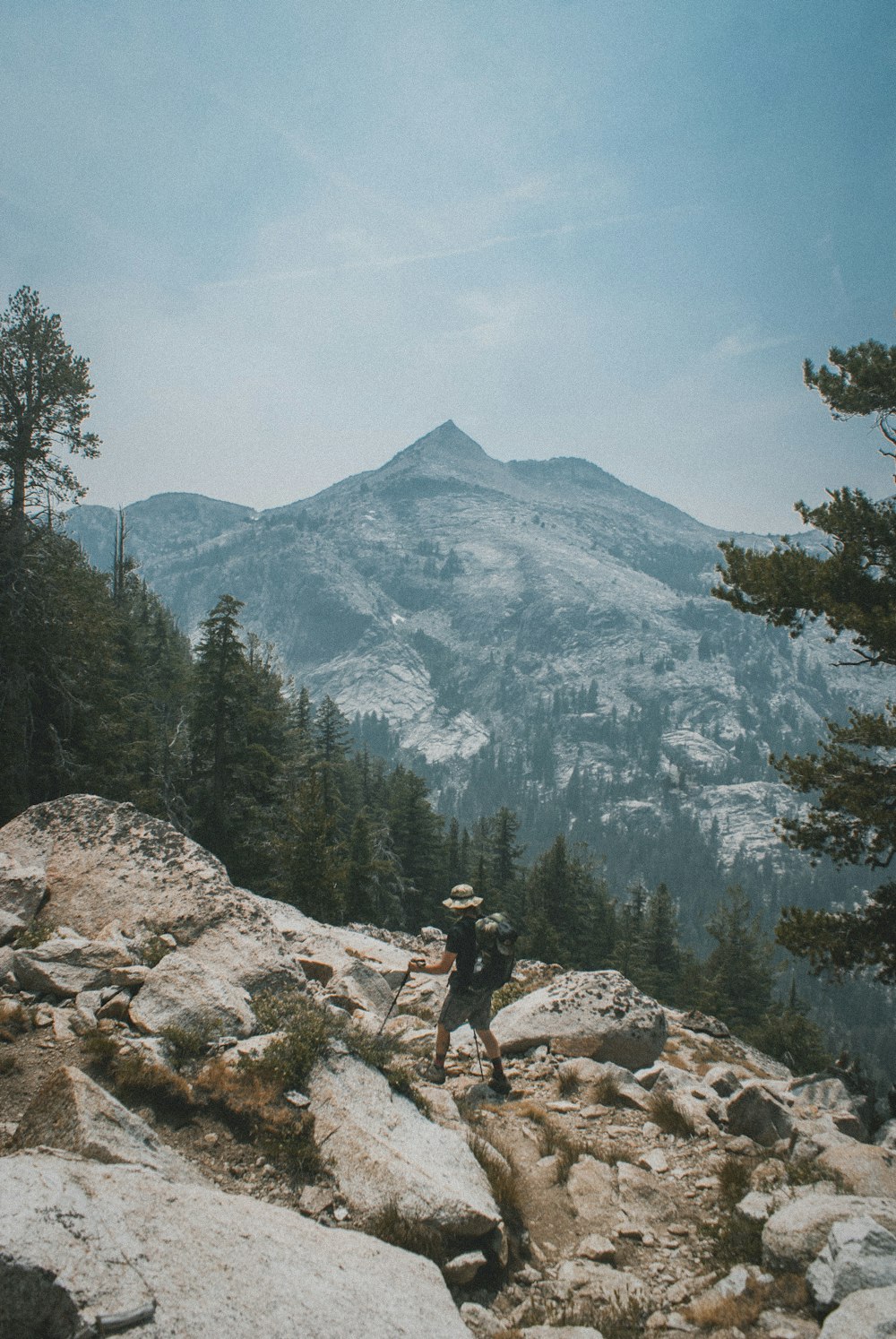 a person hiking on a rocky trail