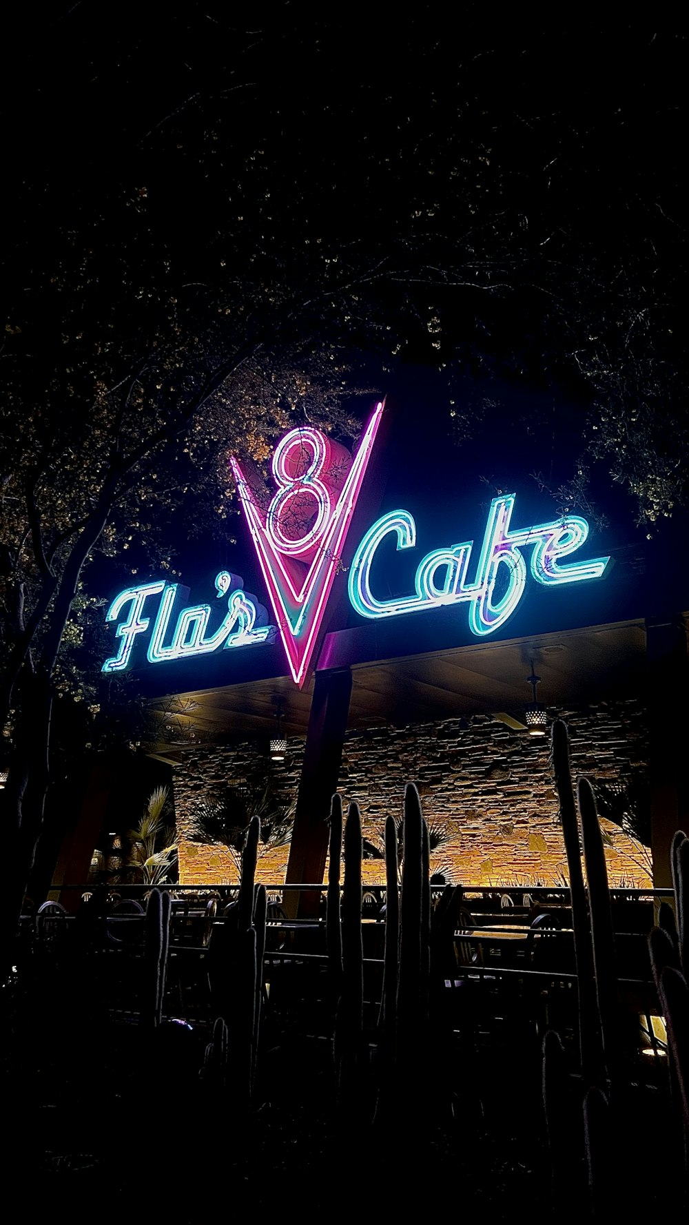 a lit up sign at night