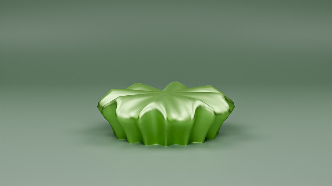 a green cube on a white surface, You can see the process of creating on youtube - Antipoligon<p></figure>