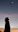a silhouette of a woman and a man in front of a sunset