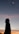 a silhouette of a woman and a man in front of a sunset