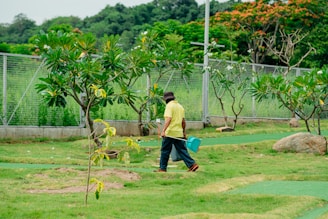 a man walking in a garden