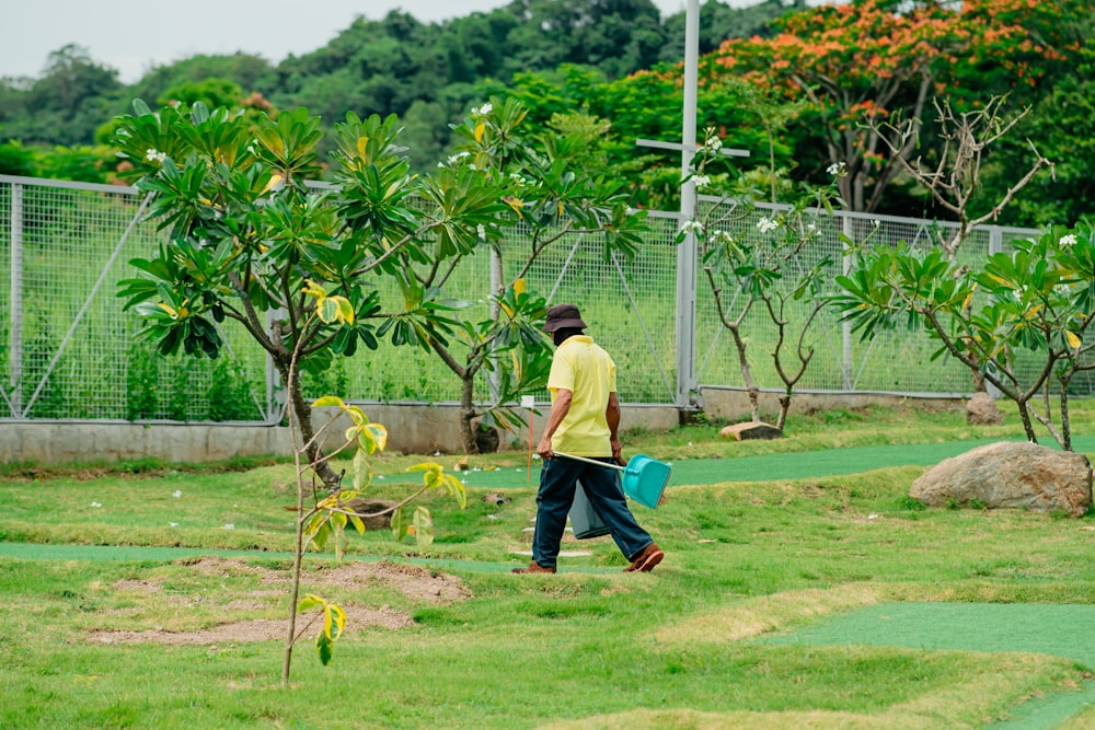 a man walking in a garden