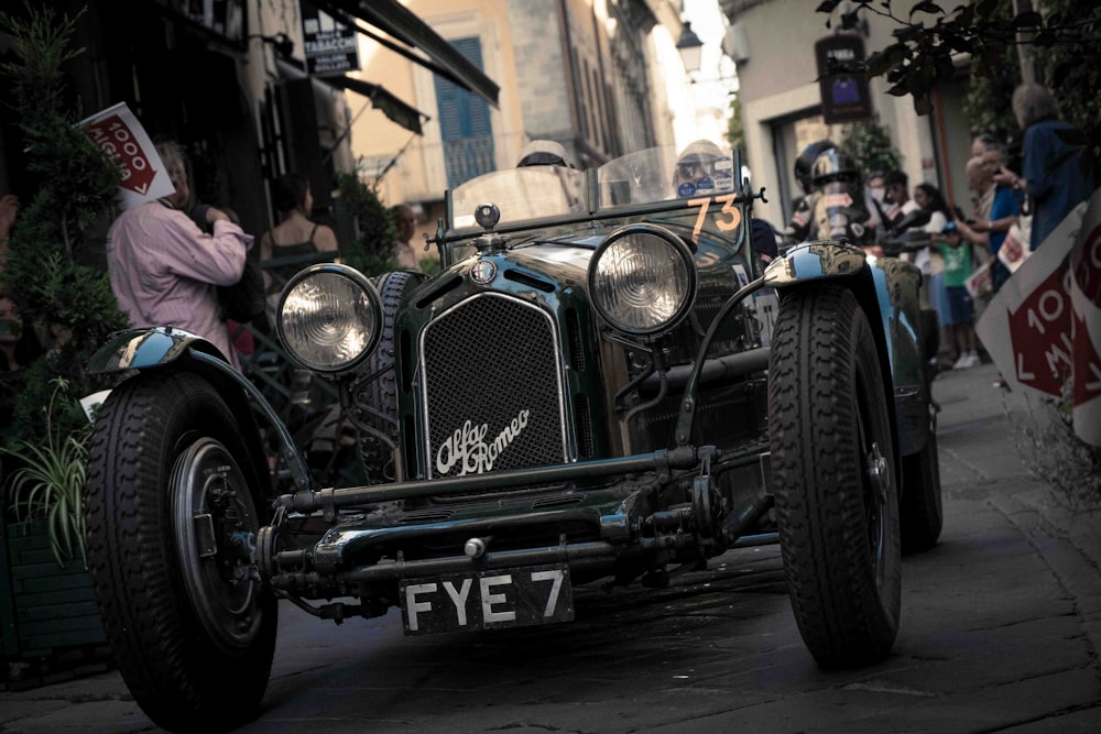 a vintage car on the street