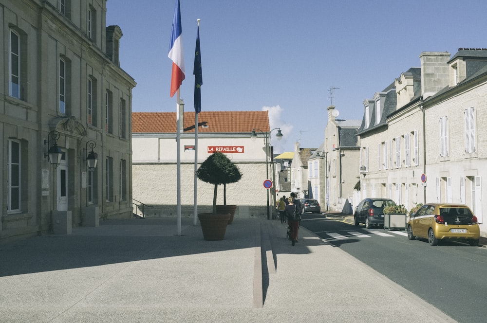 a street with cars and buildings on the side