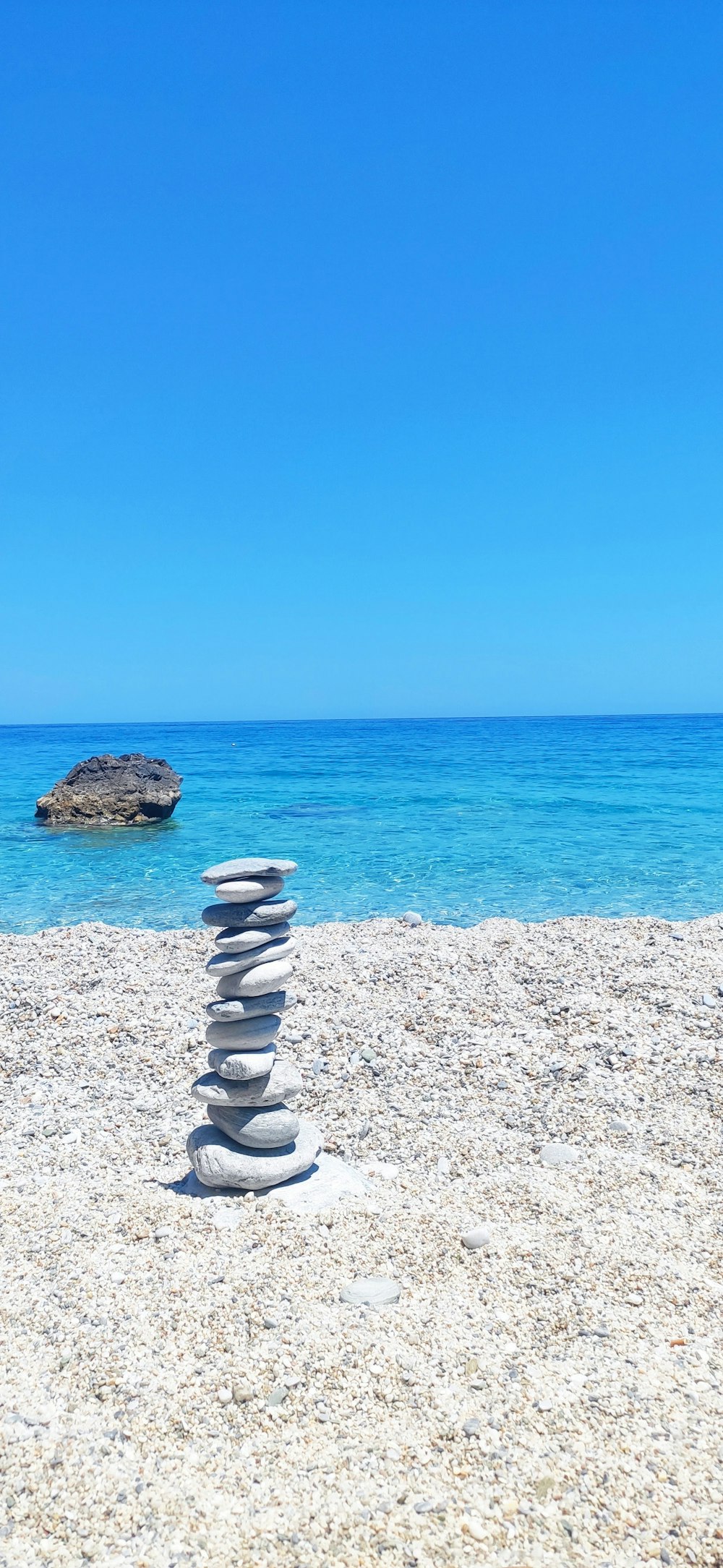 a stack of rocks on a beach