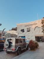 a truck parked outside a building