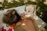 a person holding a baby