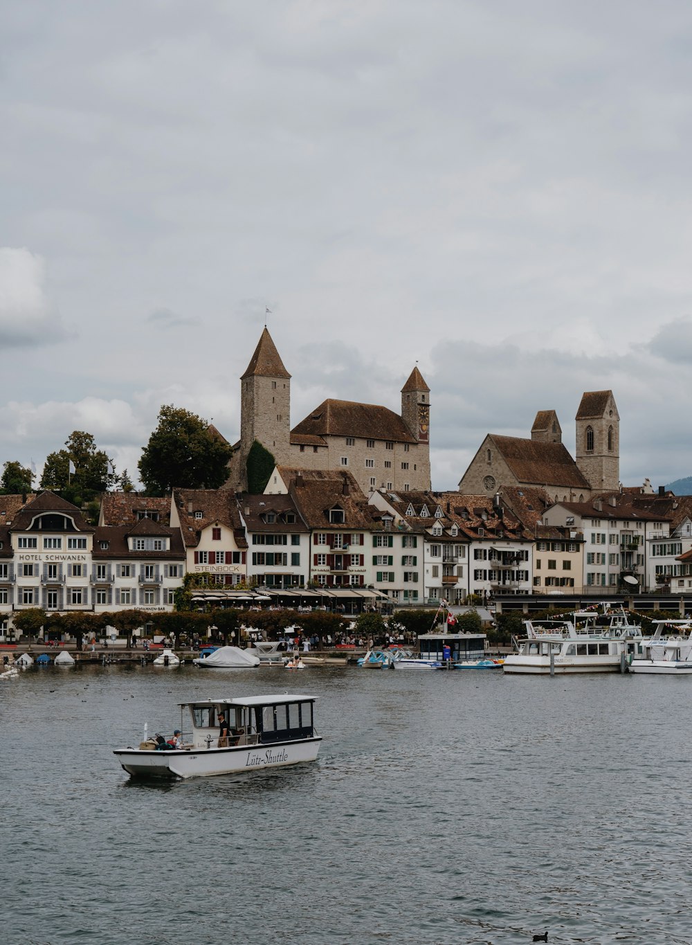 a group of boats in a harbor