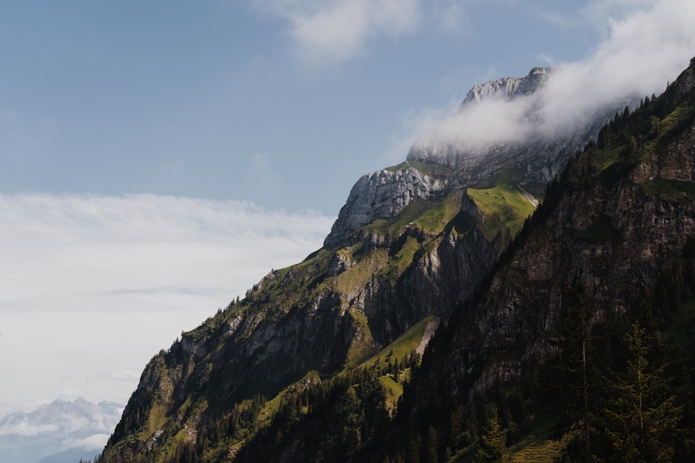 a mountain with clouds