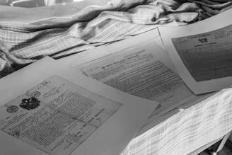 a book open on a bed