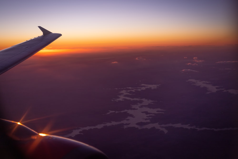 an airplane wing in the sky