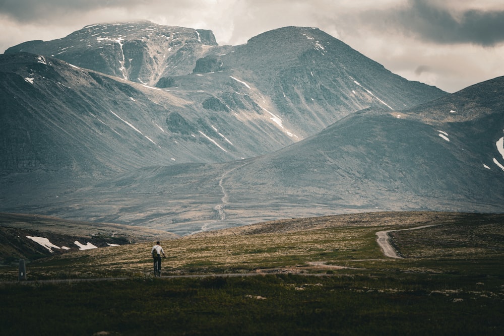 a person standing on a mountain