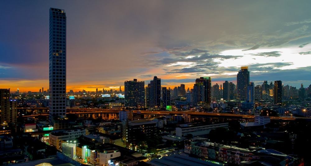 a city skyline at sunset