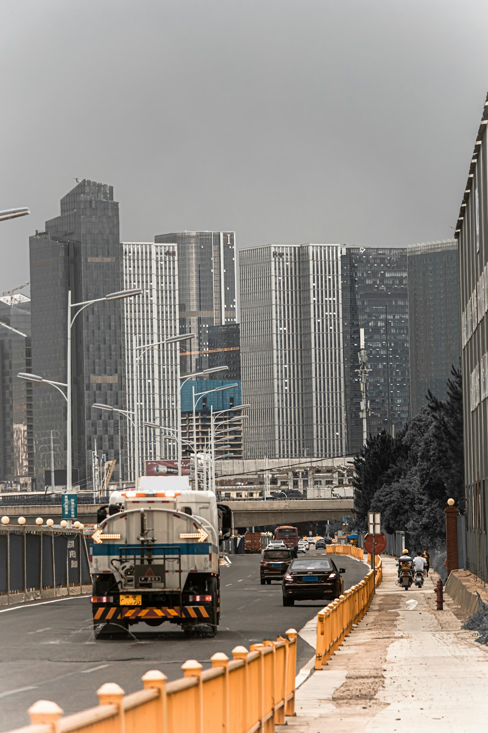 a city street with tall buildings