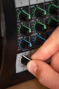 a hand holding a circuit board