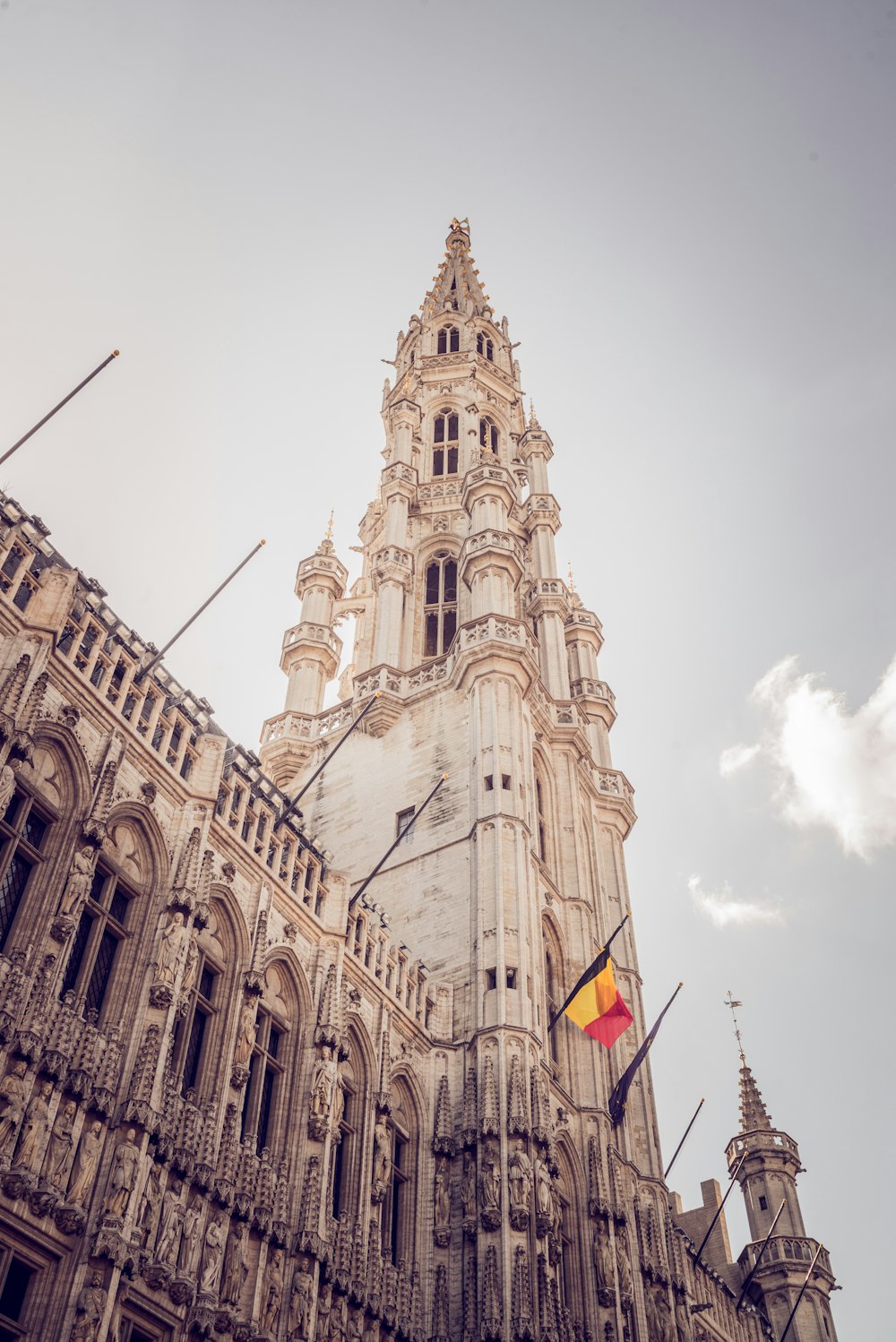 a tall building with a flag on it