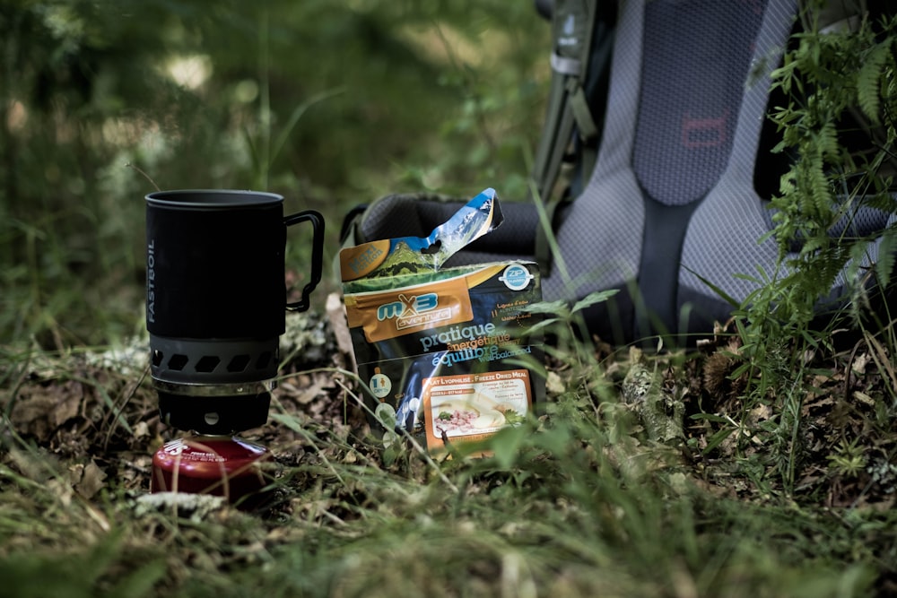 a bag of luggage sitting on the grass