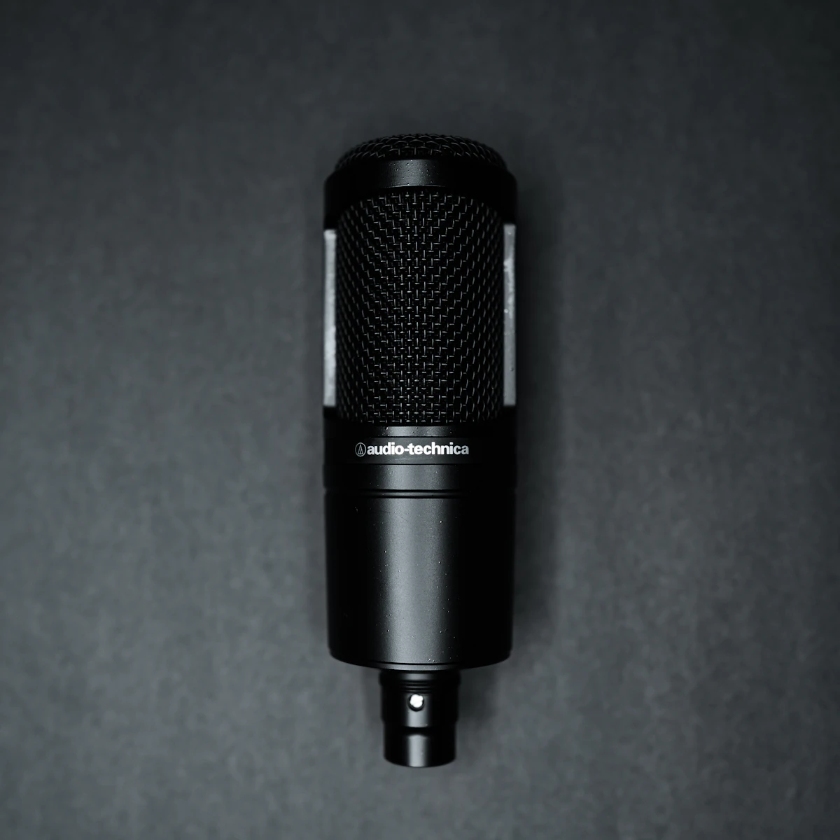 Simple home podcast recording setup with microphone