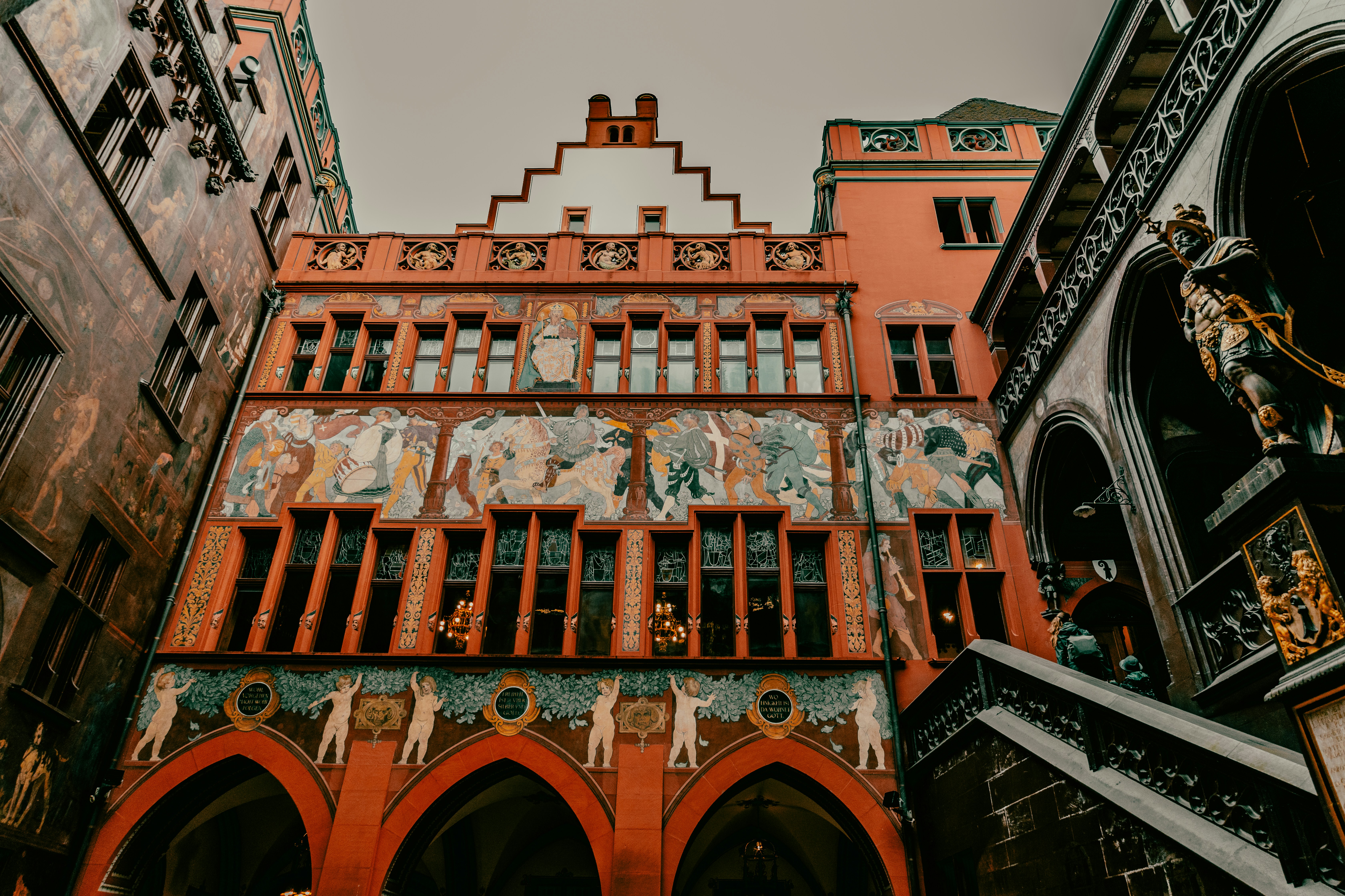 a building with statues on the side