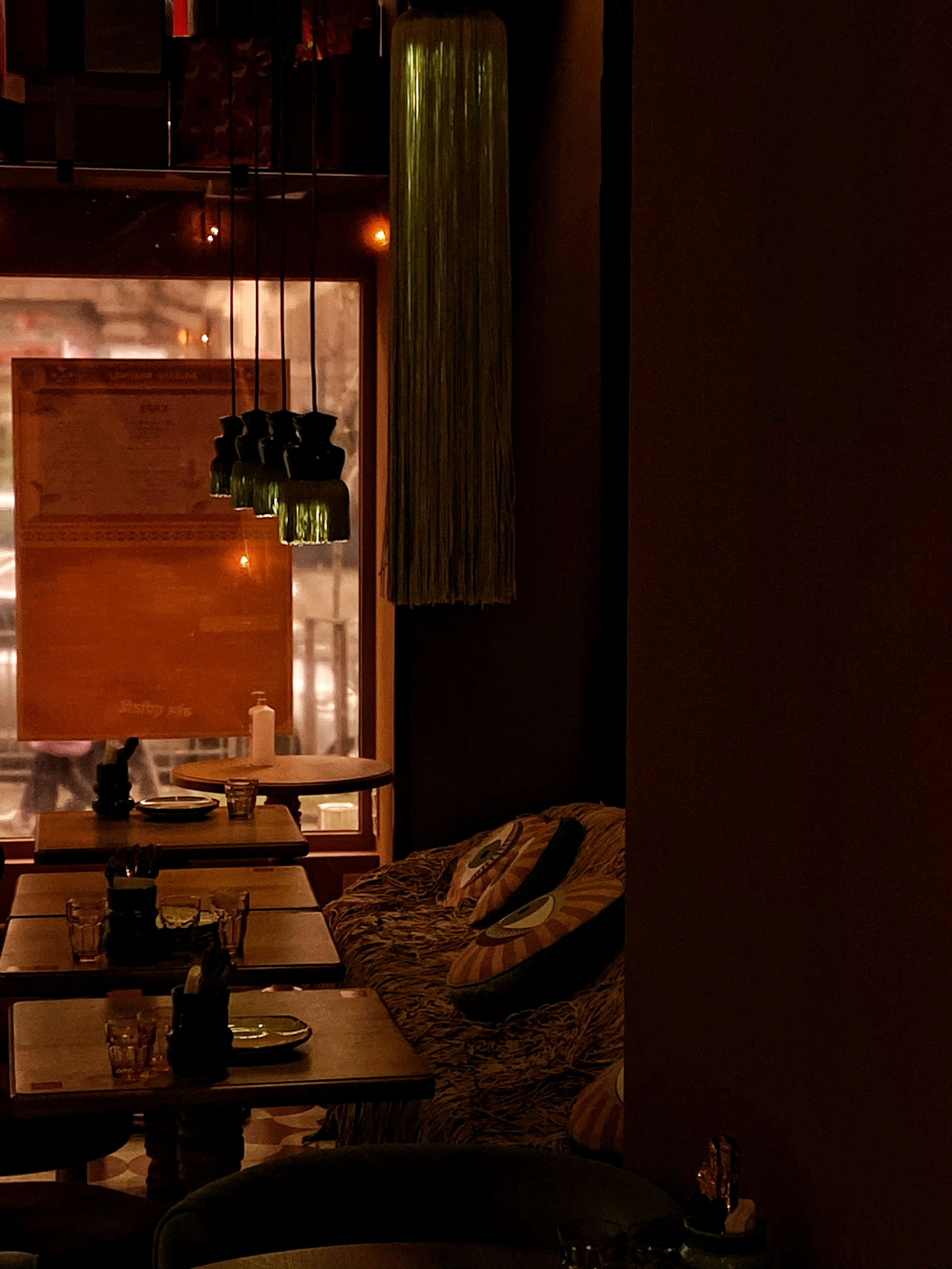 a room with a couch and tables